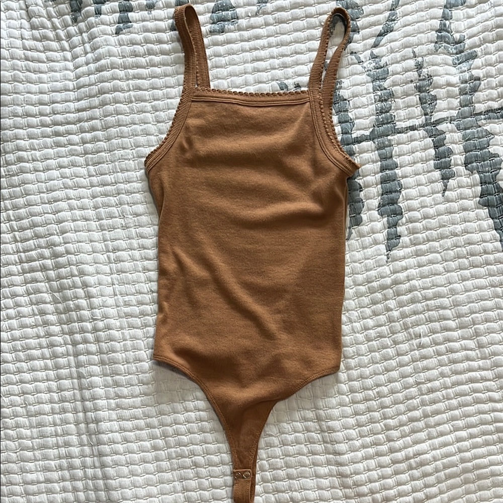 NWOT Brown Bodysuit size S.